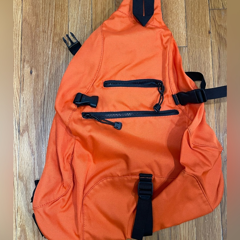 Vibrant Orange Backpack with Black Accents